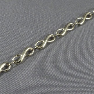 Gouden schakelarmband infinity