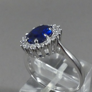 Ring zirkonia en blauwe saffier halo